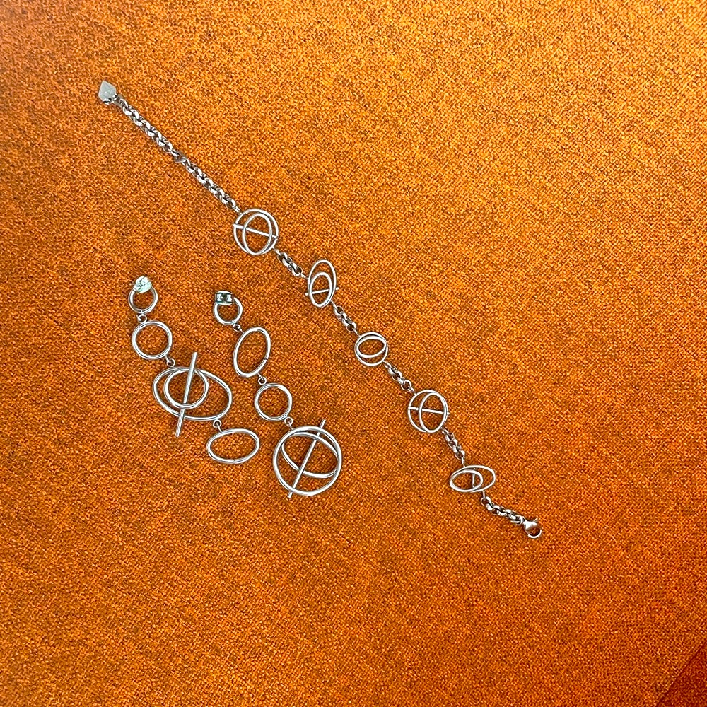 Wanderlust + Co. Steel Set Earrings And Bracelet